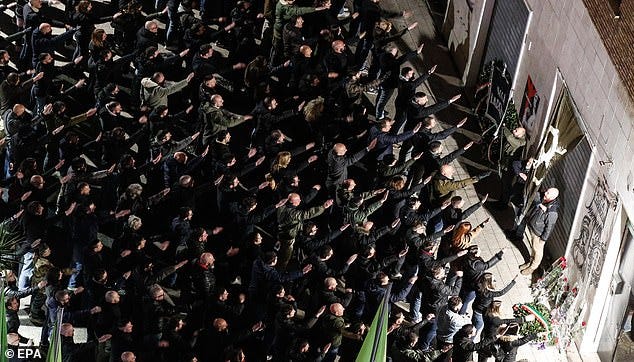 Hundreds of Italian far-right activists perform fascist salute to mark ...