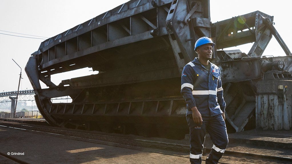 worker at coal terminal in maputo