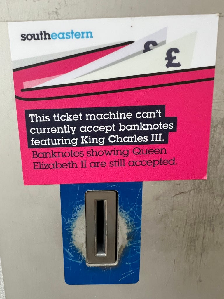 Sign on a railway ticket machine: "This ticket machine cannot currently accept banknotes featuring King Charles III. Banknotes showing Queen Elizabeth II are still accepted."