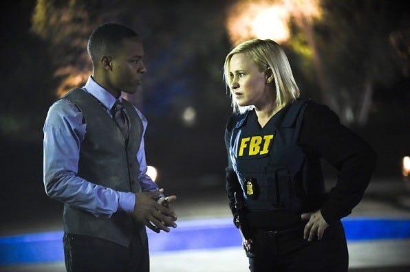 patricia arquette with black boy on csi cyber fire code 2015