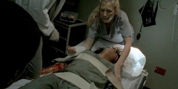 walking dead beth season 4 slabtown cutting off womans arm images 2014