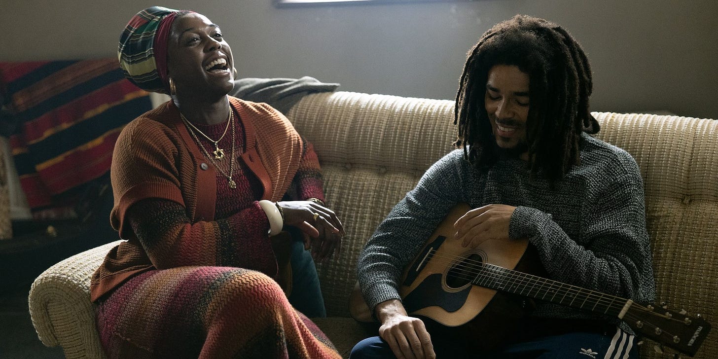 Rita laughs with Bob Marley in Bob Marley One Love