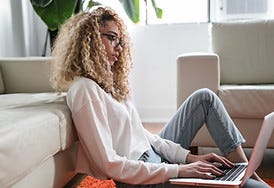 Image by Thought Catalog of a woman on her laptop