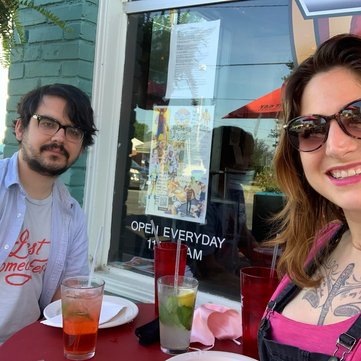 my partner, ty, and i with drinks in front of a local restaurant (it's hot for pizza, one of my fave pizza places in richmond) 
