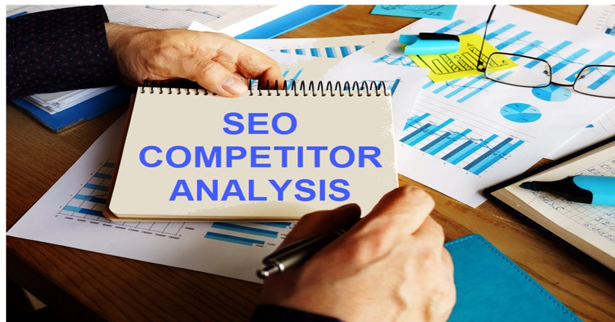 A hand holding a notebook with text of SEO competitor analysis