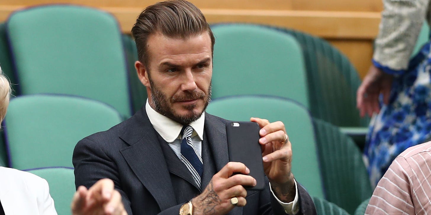 david beckham cellphone while driving gets him banned