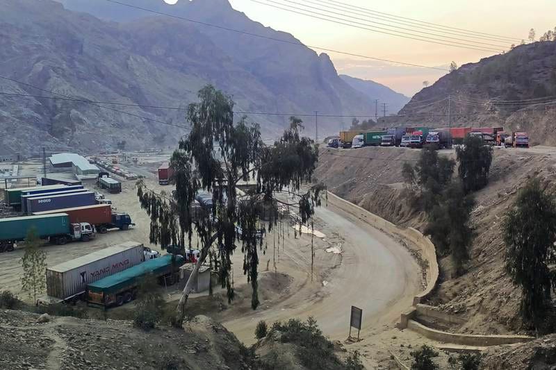 Lorries loaded with supplies for Afghanistan are left stranded at a border crossin in Pakistan's Khyber region. AP