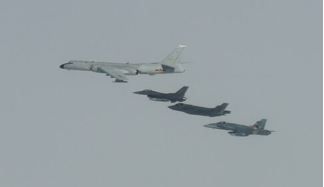 NORAD intercepts Russian, Chinese bombers. Photo shows Canadian F-18 Hornet, and American F-16 Fighting Falcon and F-35 Lightning II jets intercepting a PRC H-6 Bomber in the American air defense zone off Alaska. July 24, 2024.