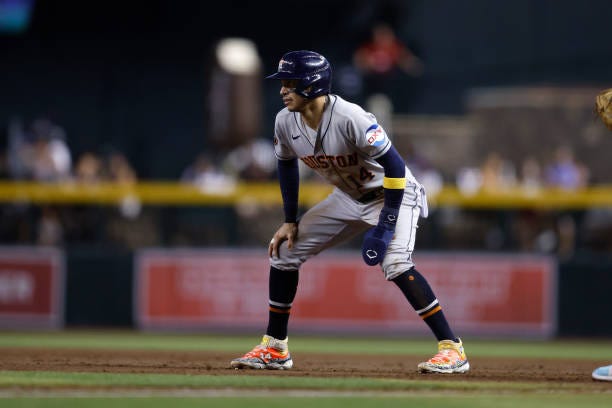 Mauricio Dubon of the Houston Astros leads off first base during the game against the Arizona Diamondbacks at Chase Field on September 30, 2023 in...