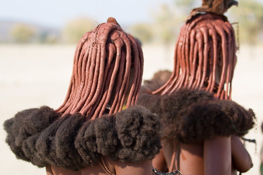 Namibia's Himba tribeswomen and their elaborate hairdos. | Hadithi Africa