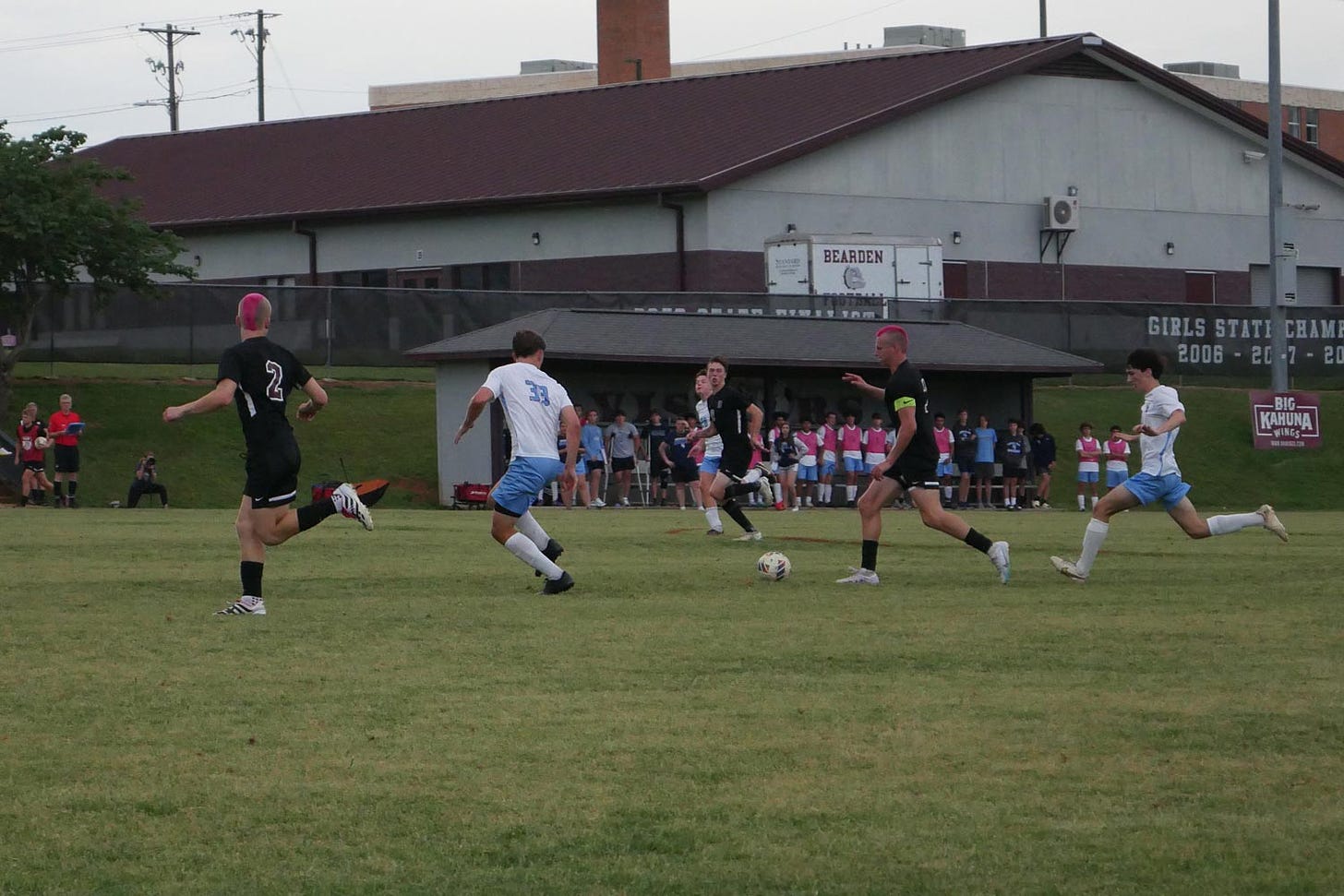 Bearden and Hardin Valley Academy boys soccer players compete for a ball.