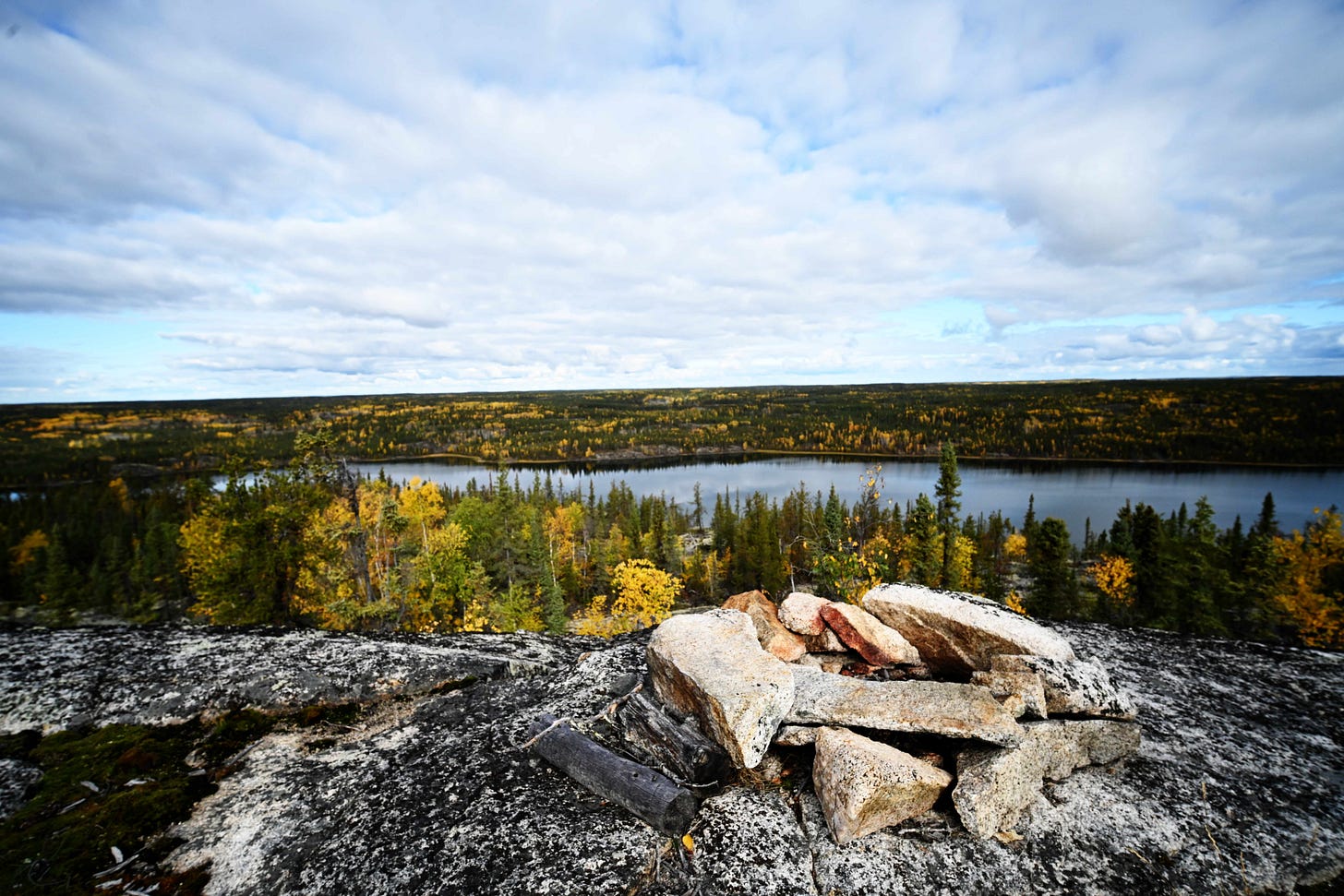 A place to build a campfire overlooking a lake