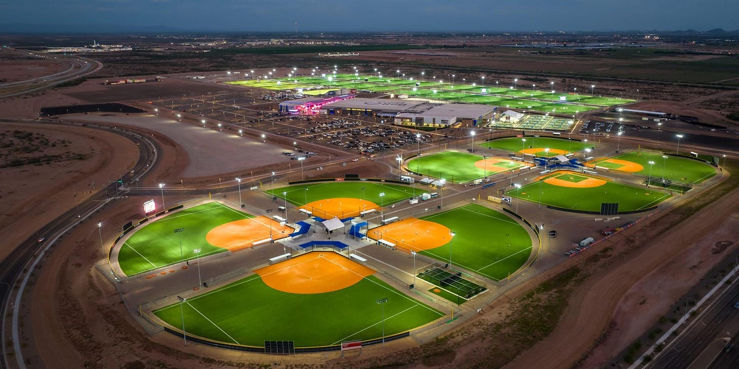 Aerial view of Bell Bank Park in Mesa AZ lit up at night