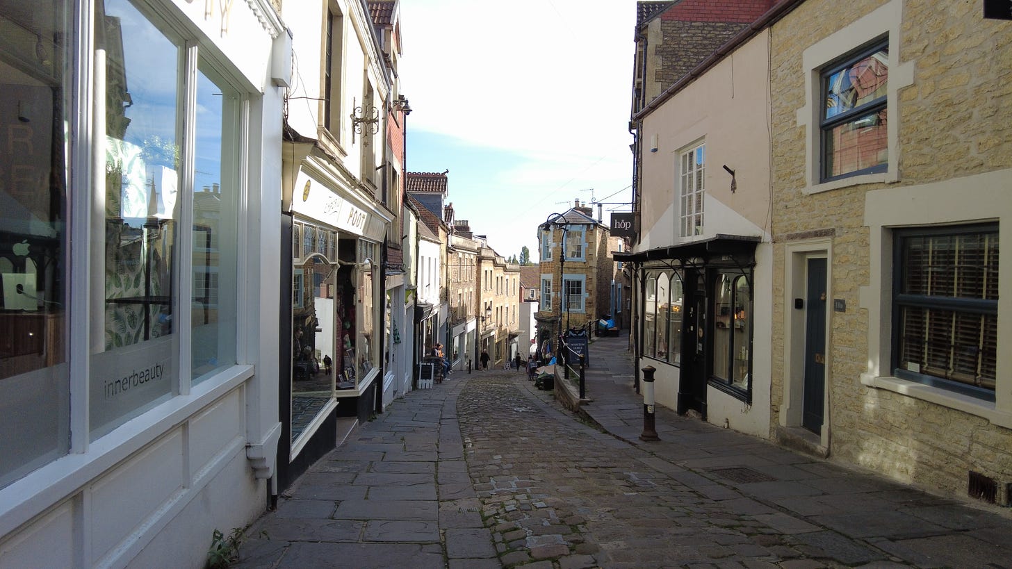 Catherine Hill, Frome, Somerset. This is a steep hill full of artisan shops and very interesting old buildings with many tales to tell. It is packed with history.
