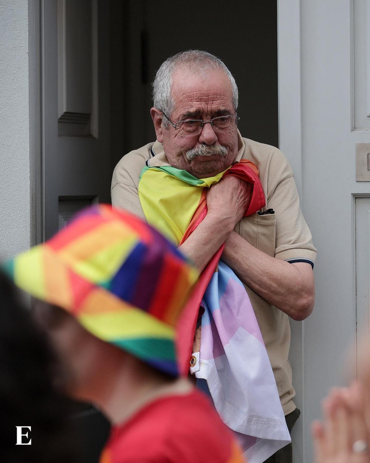 At the Porto Pride on June 29th, a resident stepped out of his door and greeted the crowd by waving the national flag, which caught a participant’s attention. At first, worried he could be adversarial, it turned out that he wanted to support the march but did not have a pride flag and they swapped the progress pride flag for the Portuguese one. This exchange, which ended with a heartwarming embrace, was also captured on video here. (Manuel Fernando Araújo / Lusa Agency / Expresso)