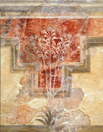 A Minoan fresco from the Villa of the Lilies in Amnisos, showing a spray of white lilies against a dark red backdrop in a scene of a walled garden