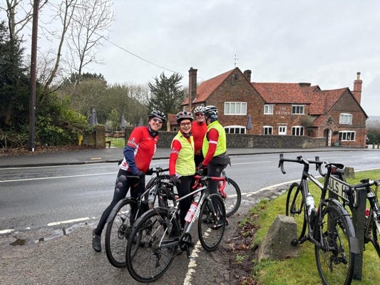 A group of people on bicycles

Description automatically generated