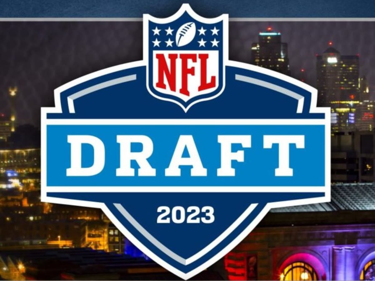 Logo of the 2023 NFL Draft, overtop a night time backdrop of Kansas City