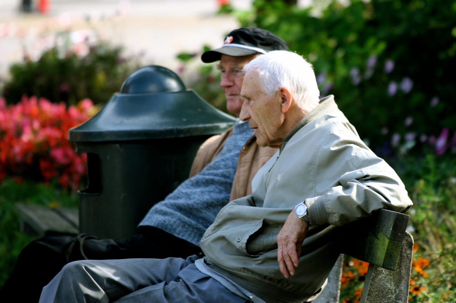File:Two old men sitting on a bench (365432689).jpg - Wikimedia Commons