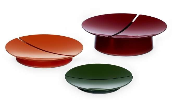 These lacquered wood plates designed for Hermes suit the luxury brand's sophisticated aesthetic to the ground