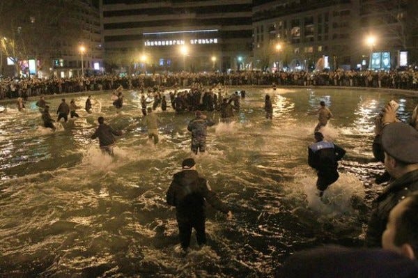 kanye west fans jump into swan lake 2015