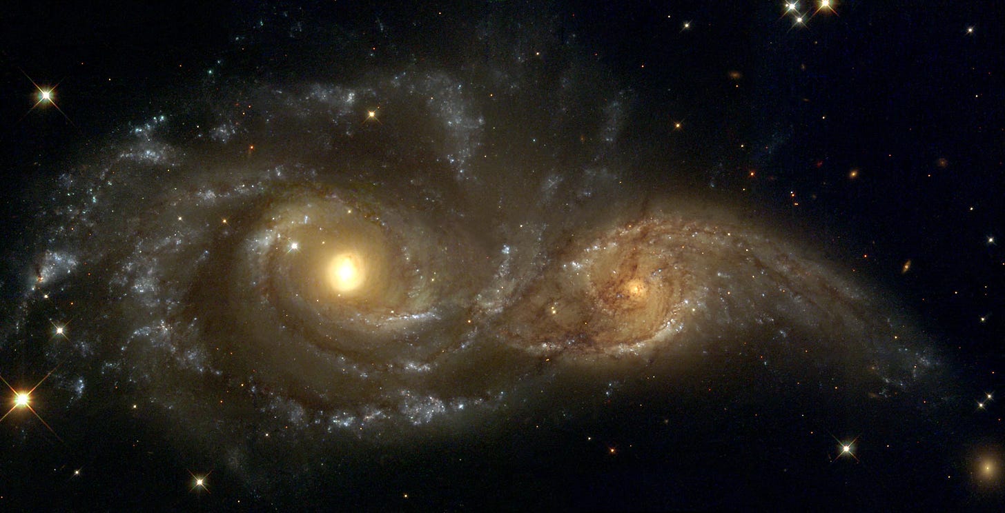 image of two galaxies interacting