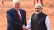 Donald Trump shakes hands with Narendra Modi