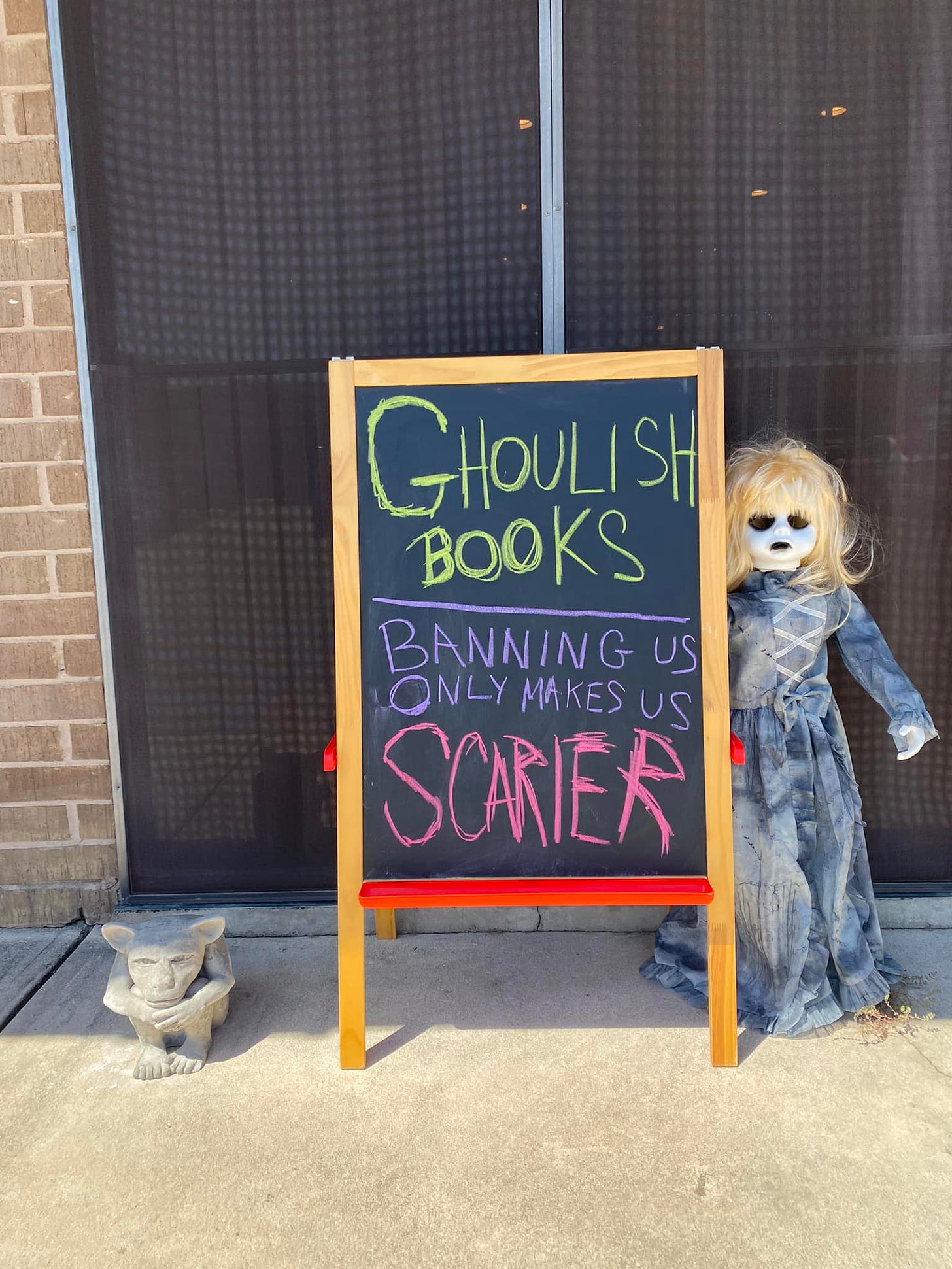 May be an image of text that says 'GHOULISH BOOKS BANNING US ONLY MAKES SCARIER US'
