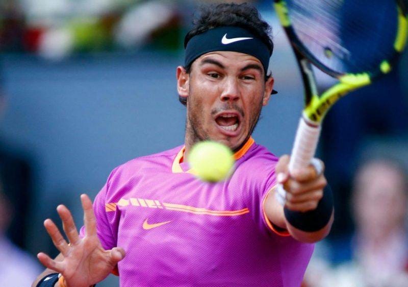 rafael nadal beating back dominic thiems balls in madrid open