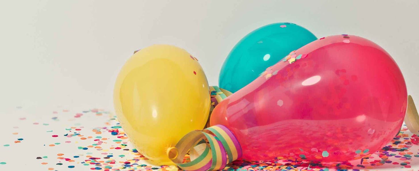 colorful balloons with confetti