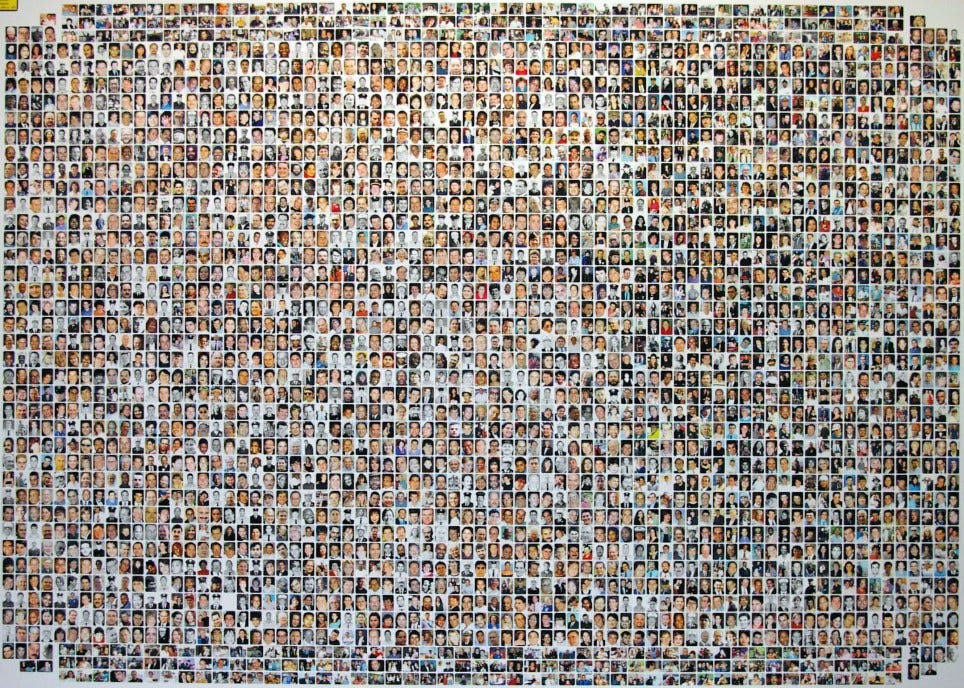 A montage showing the faces of all the 9/11 victims