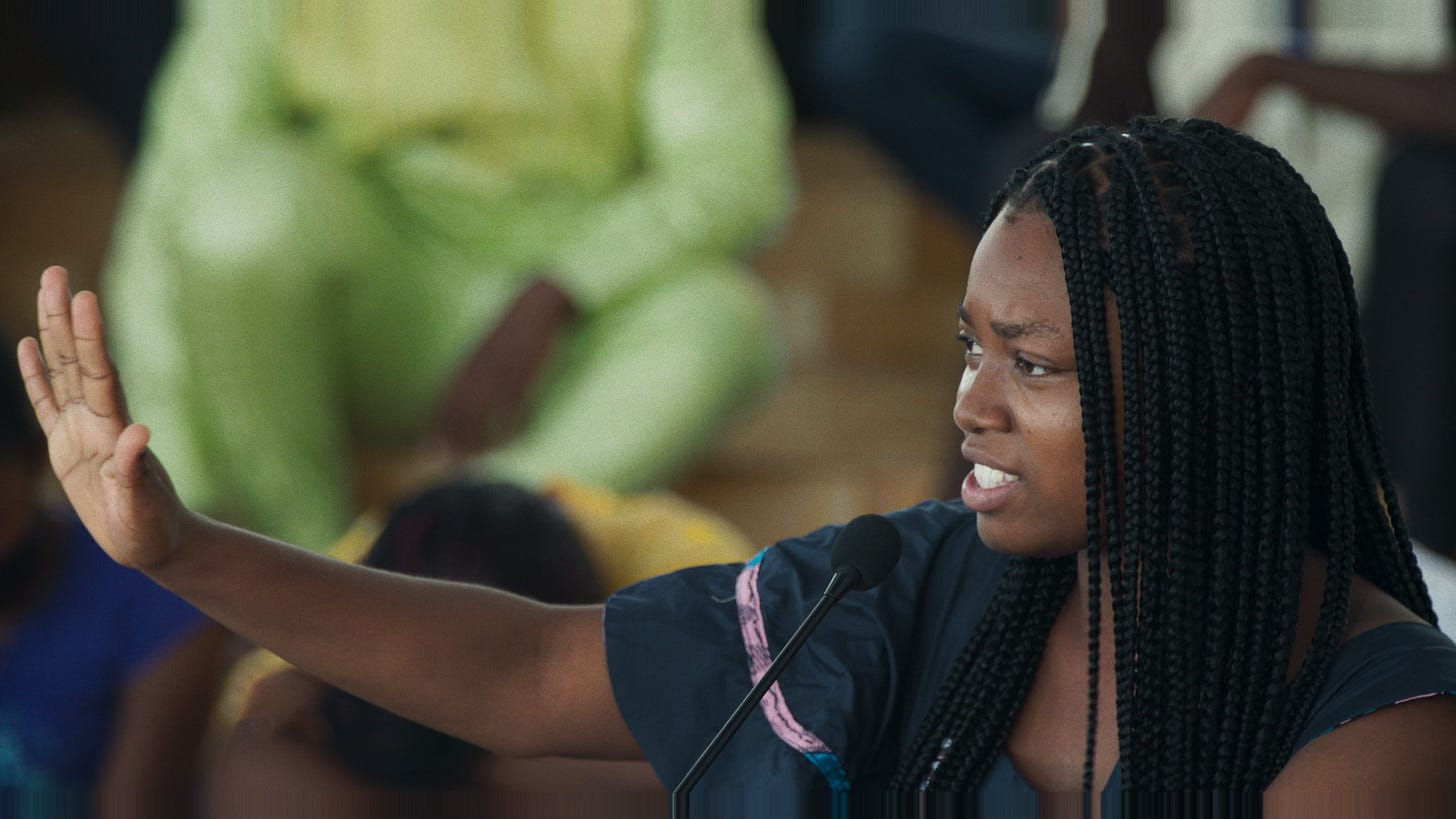 A student at the University of Abomey-Calavi speaks during an open debate in Dahomey