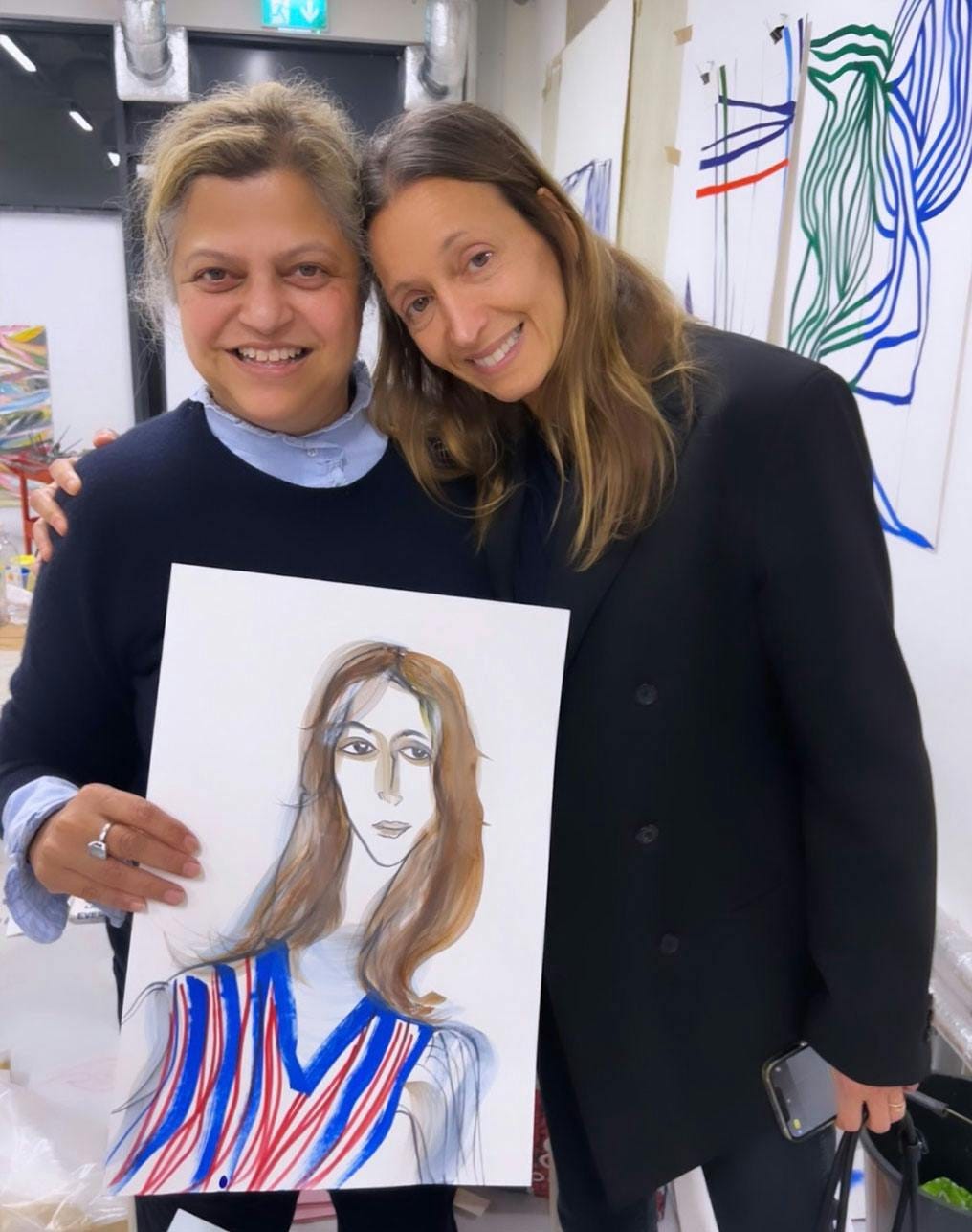 Tanya Ling and Nikki Kule at studio with painting of Nikki
