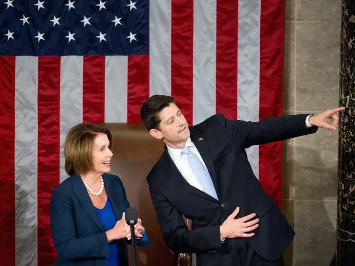 Then-Rep. Paul Ryan of Wisconsin points toward his family in the House chamber alongside then-House Minority Leader Nancy Pelosi of California on October 29, 2015.