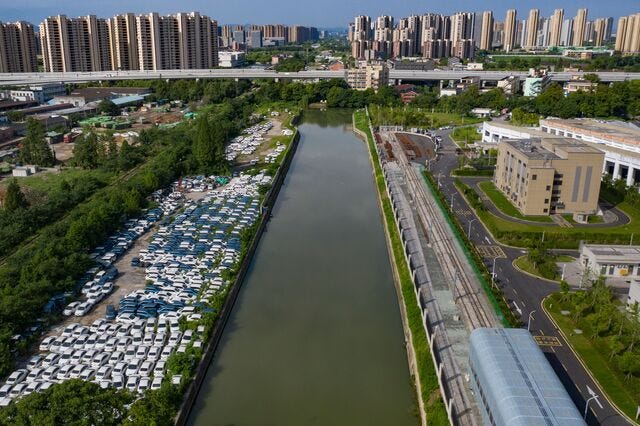 A view of a lot holding decommissioned electric vehicles in Hangzhou, China.