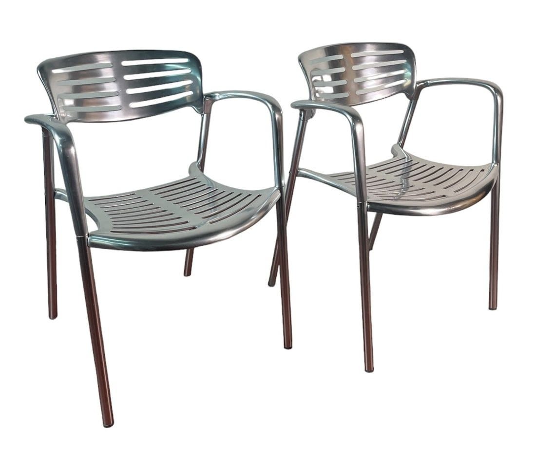 PAIR OF KNOLL JORGE PENSI POLISHED STACKING CHAIRS