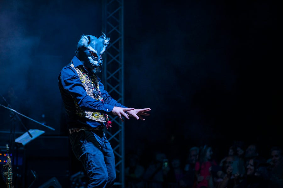 Man with the mask of a werewolf. Man with the mask of a werewolf.