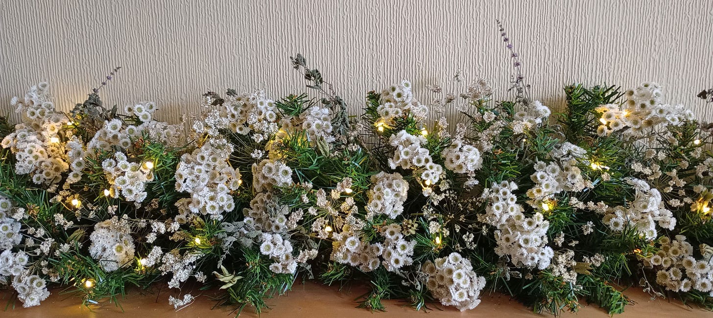 My Christmas garland decorated with dried flowers from my garden