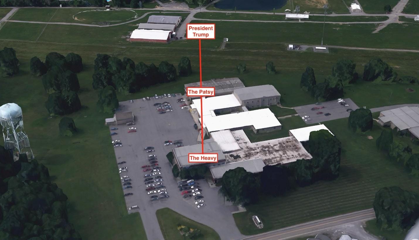 Aerial view of a building with parking lot and parking lot

Description automatically generated