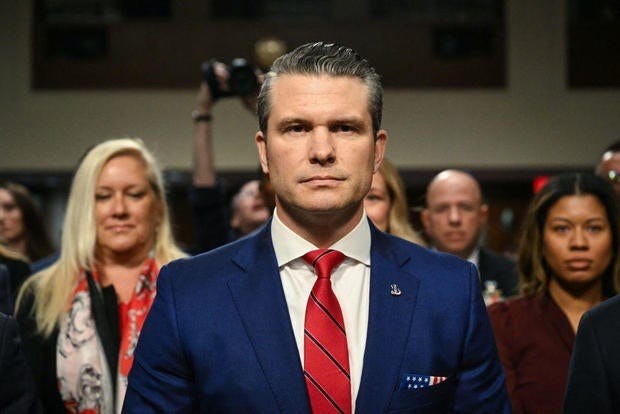 Pete Hegseth takes his seat at his confirmation hearing before the Senate Armed Services Committee on Capitol Hill on Jan. 14, 2025. 