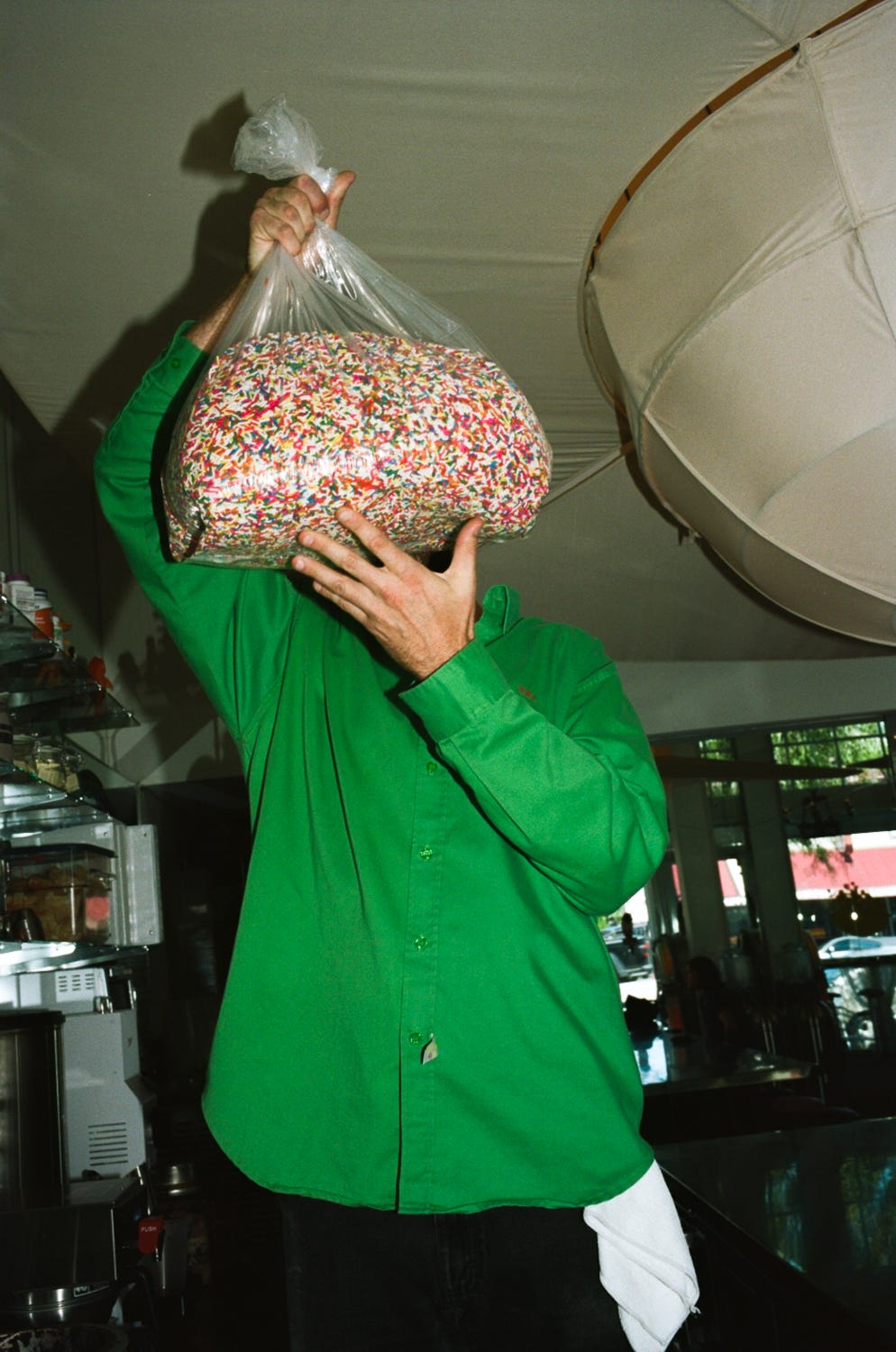 Fisher holds a bag of sprinkles