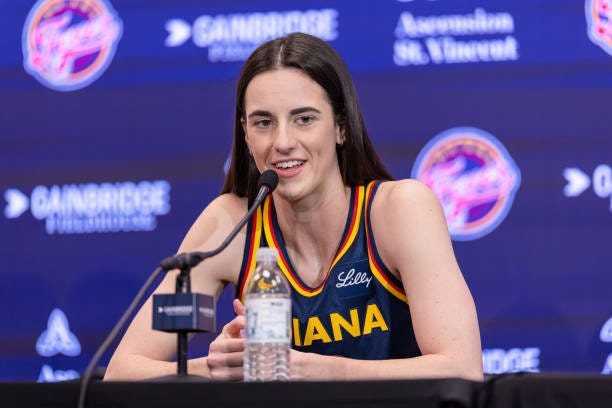 Caitlin Clark of the Indiana Fever talks to reporters during media day activities at Gainbridge Fieldhouse on May 1, 2024 in Indianapolis, Indiana....