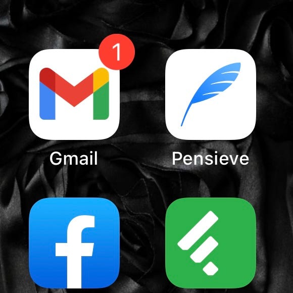 Screenshot of phone screen showing a red notification icon on gmail