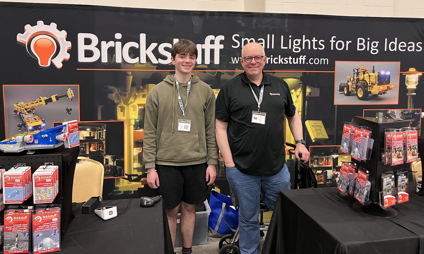 Picture of two people working at the Brickstuff booth at the Brick Days Omaha 2025 LEGO convention.