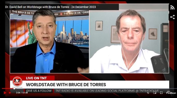 May be an image of 2 people, television, newsroom and text that says 'Dr. David Bell on Worldstage with Bruce de Torres- 24 December 2023 THE BRUCE DE το THEBRUCE DE ORR NT RADIO LIVE ON TNT WORLDSTAGE WITH BRUCE DE TORRES USAFOLLOW TNT AVAILABL ON PLATFORMS PodBean'