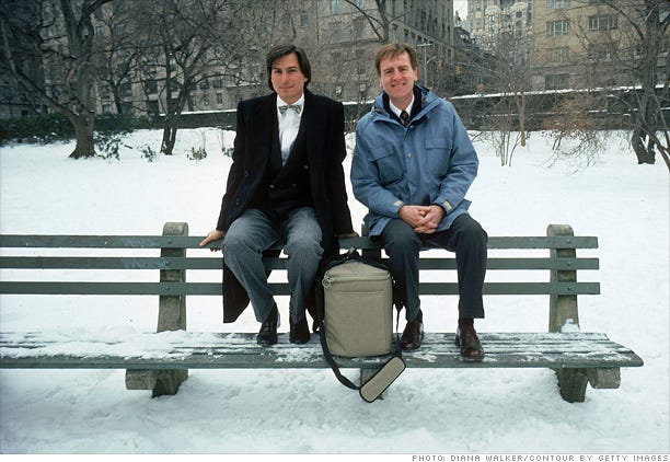 Steve Jobs and John Sculley sitting atop a bench in Central Park.
