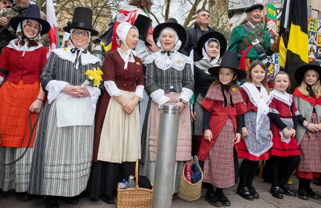 Villagers dressed in traditional Welsh costume