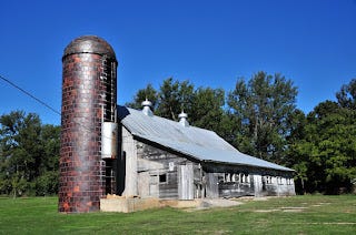 recent image of a clay block silo