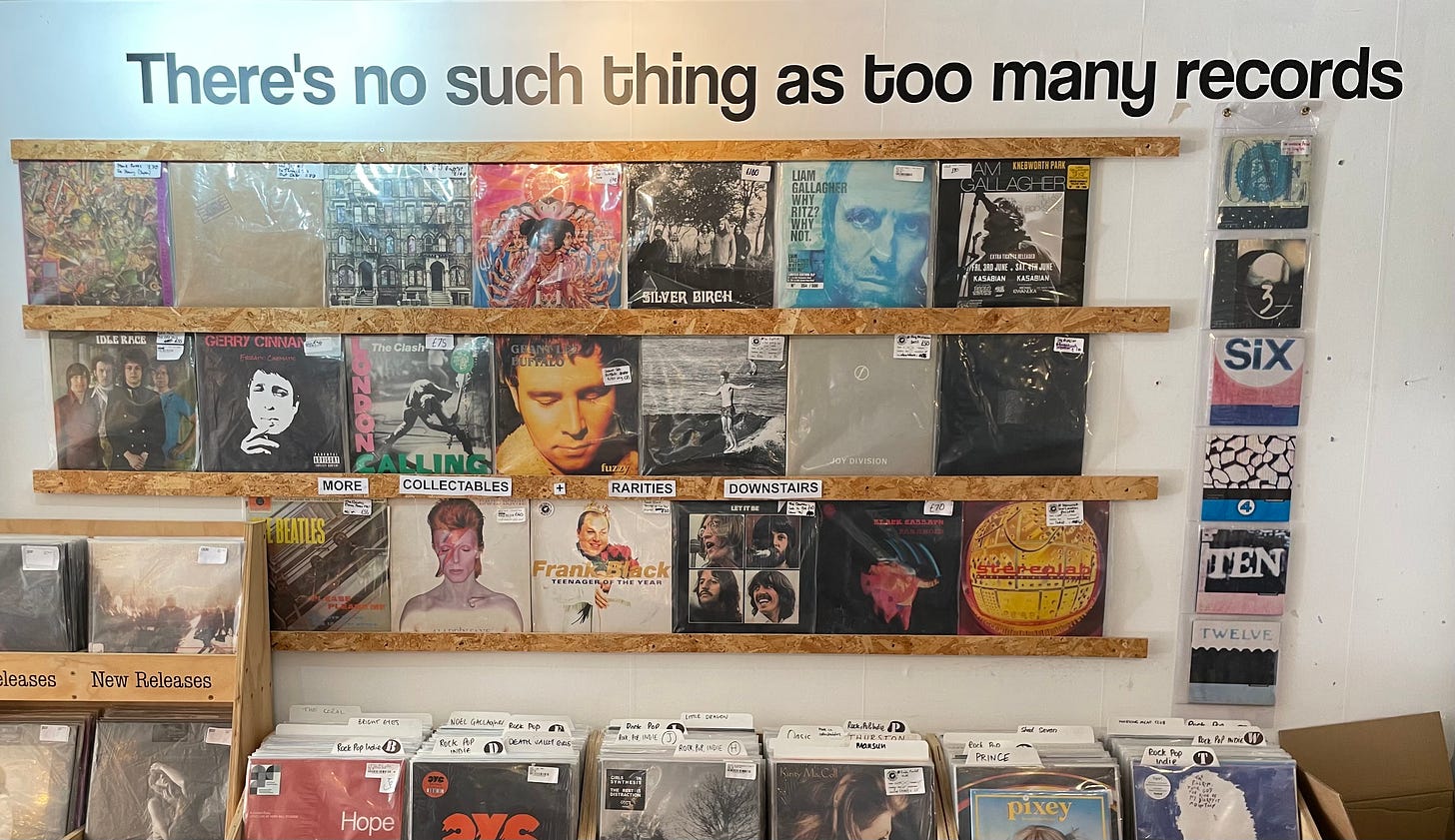 Motivational quotes for record shoppers on the collectibles wall in The Vinyl Whistle