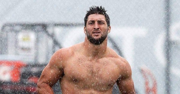 tim tebow running shirtless bulge in rain for philadelphia eagles 2015